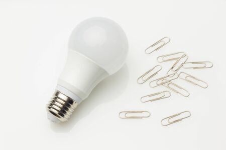 Low consumption, less heat, responsible consumption with energy; energy saving light bulbs and maximum brightness to see well, read well; Perfectly illuminate our home and our workplace. Saving money.の写真素材
