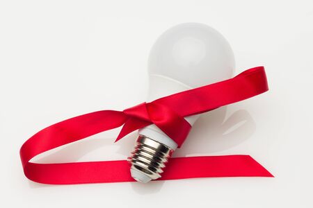 Low consumption, less heat, responsible consumption with energy; energy saving light bulbs and maximum brightness to see well, read well; Perfectly illuminate our home and our workplace. Saving money.の写真素材