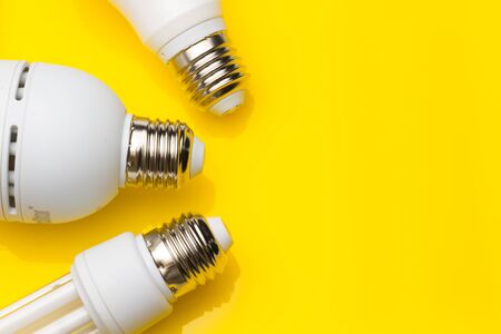 Low consumption, less heat, responsible consumption with energy; energy saving light bulbs and maximum brightness to see well, read well; Perfectly illuminate our home and our workplace. Saving money.の写真素材