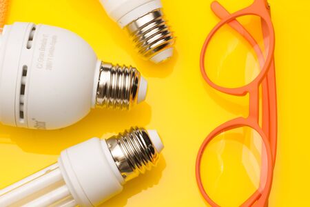 Low consumption, less heat, responsible consumption with energy; energy saving light bulbs and maximum brightness to see well, read well; Perfectly illuminate our home and our workplace. Saving money.の写真素材