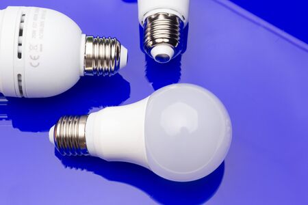 Saving electric energy and paying less in electric energy thanks to energy-saving light bulbs to make a planet more sustainable and ecological. Low consumption in homes and jobs.の写真素材