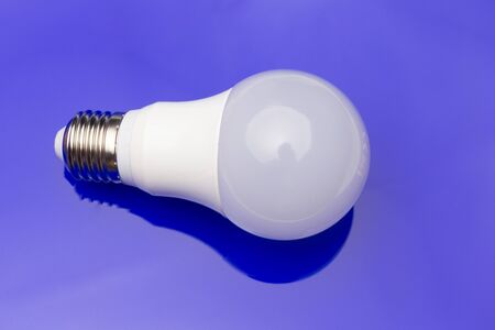 Saving electric energy and paying less in electric energy thanks to energy-saving light bulbs to make a planet more sustainable and ecological. Low consumption in homes and jobs.の写真素材