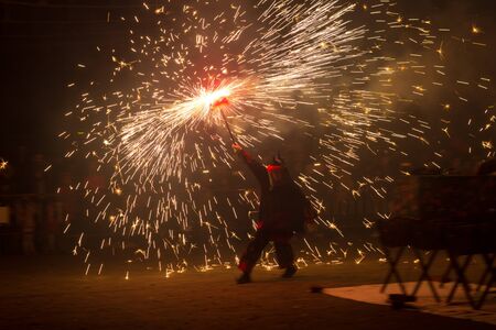 Dance, fire and devils, folklore and Mediterranean festival in which fire is the protagonist; end of Carnival. Party in which the devils with fire walk through the city. Popular festival of Catalonia.の写真素材