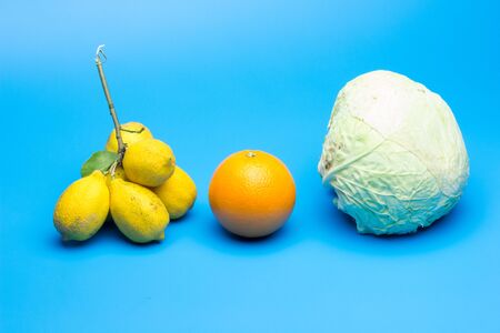 Cabbage green, orange orange and lemon yellow, citrus and vegetables