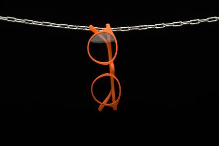 Vision corrective glasses with corrected glasses for perfect vision, to see near and far. Designer lenses with different colorsの写真素材