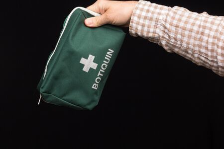 For the first cures, a first aid kit is necessary in which basic sanitary material, such as betadine, alcohol, bandages, scissors, pain relievers, sticking plaster, plasters, must be used.の写真素材