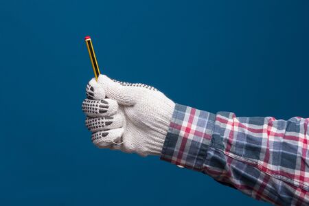 Professional hands protected with industrial gloves. Gloves for hand protection. Hands with medicine products, industrial products, glasses, medicine cabinet.の写真素材