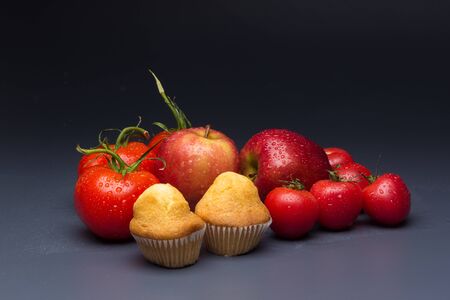 Tomatoes and apples, red fruits, for salads to eat raw, full of vitamins and few calories ideal for dieting.の写真素材