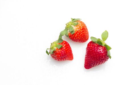 Red strawberries, rich in vitamins, eaten raw, in jam, in ice cream, few calories, sweet taste.の写真素材