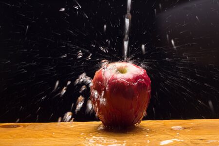 The apple is a fruit that is eaten raw although it can be cooked and used in the kitchen as an accompaniment to some dishes, it can be made into juice, compotes, it can be cooked in the oven.の写真素材