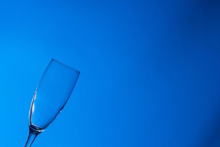 Clear, drinking water falls into a clear glass, healthy, wholesome, fresh water with no odor or taste. Splash of water drops splashing onto the surface. Jet of water entering the glassの写真素材