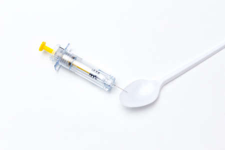 Vaccine concept close up of vaccination vial with syringe
