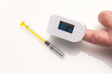 The process of measuring the level of oxygen in the blood. Concept. A pulse device for measuring...