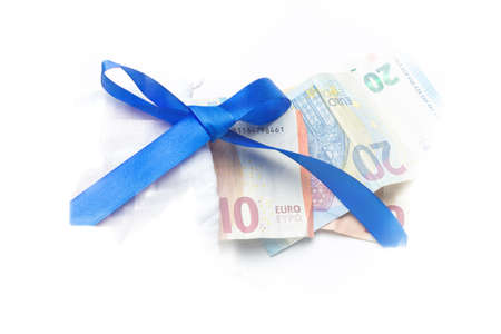 Bag full of money in Euro notes, Saving outside the traditional banking system. Euro banknotes inside a white bag. Money laundering.の写真素材