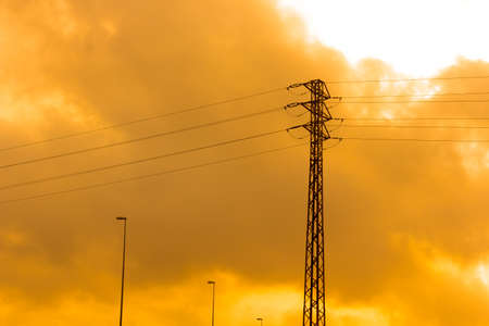 Electric tower that supports the copper wires to transport electric energy to all houses and factories.の写真素材