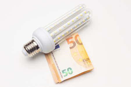 Money and energy-saving light bulbs to save money and save the world from pollution and climate...