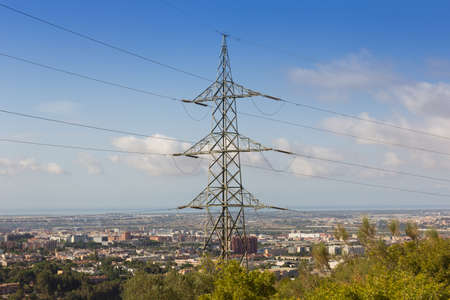 An electric tower in the mountains, overcoming the mountainous terrain to bring electricity to...