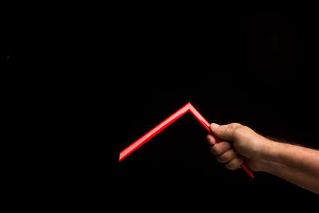Different colors in the hand showing the camera simple and primary colors, bright colors on a black...