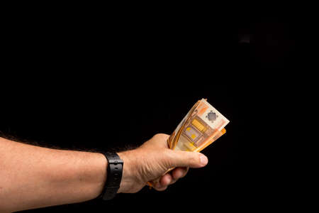 Make debt repayments or save money for the future, deposit cash in the bank. Investing in financial...