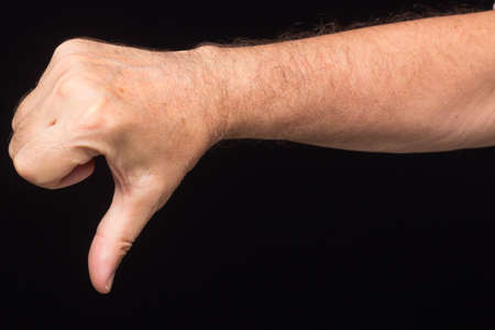 Signs and signals made with the fingers of the hand of an adult male; closed or open fist. Sign...