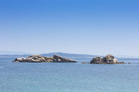 Marine views of the Atlantic Ocean, with calm sea and rocky coast.の写真素材