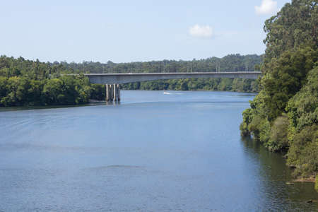 MiÃ±o river passing through Tui, Galicia, Spain. Caudaloso river which is the border between Spain...