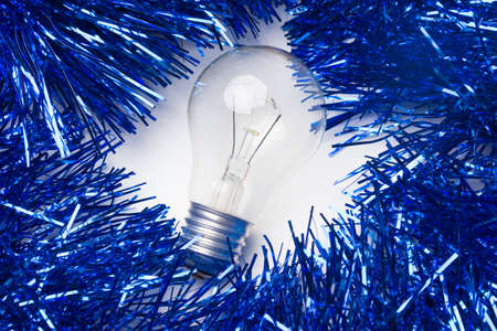 Light bulbs and Christmas decorations. Electricity consumption at Christmas