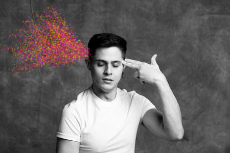 symbolically shooting yourself with the fingers of your hand