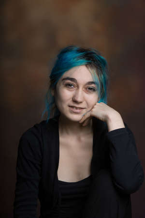 photo of young woman expressing melancholy, sadness, reflectionの写真素材