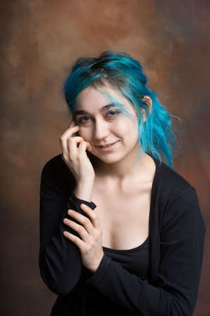photo of young woman expressing melancholy, sadness, reflectionの写真素材