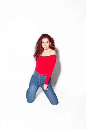 Poses on a white background of a young, beautiful and sexy womanの写真素材