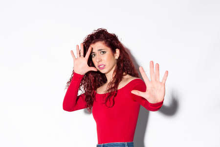 Poses on a white background of a young, beautiful and sexy woman