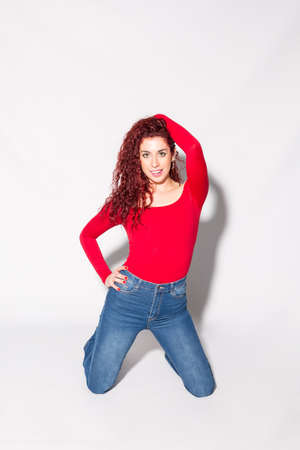 Poses on a white background of a young, beautiful and sexy womanの写真素材