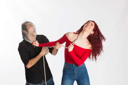 young couple with problems arguing in a very violent wayの写真素材