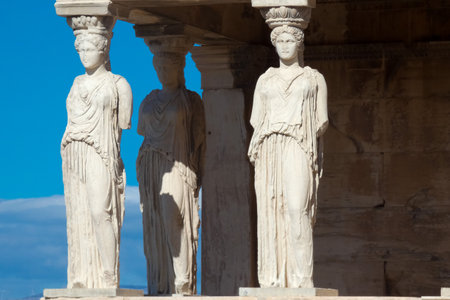 Caryatids, female draped figures, serving as supporting columns of the erechtheion, an ancient Greek temple on the north side of the acropolis of Athensの写真素材