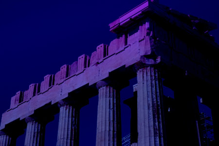 Tourists and guides visiting the parthenon on the acropolis of athens, greece, during restoration worksの写真素材