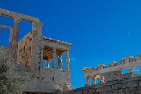 Caryatids, female draped figures, serving as supporting columns of the erechtheion, an ancient Greek temple on the north side of the acropolis of Athensの写真素材