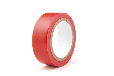 Red insulating tape on white backgroundの写真素材