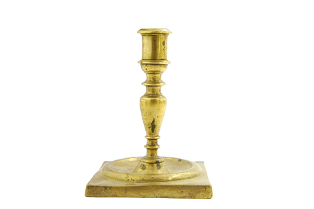 Old bronze candlestick holder isolated on white backgroundの写真素材