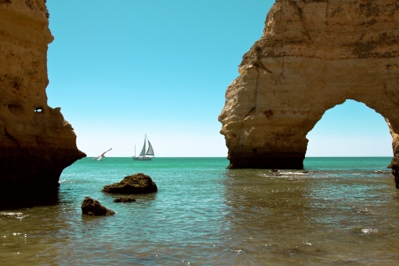 Coast view with a boot and moonlightの写真素材