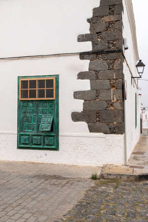 Window view and street corner in Villa de Teguise, Lanzarote island, Canary Islands, Spain