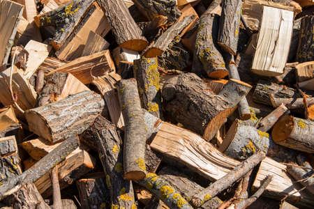 image of a pile of firewood, closeup