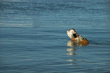 Remains of a sunken boatの写真素材