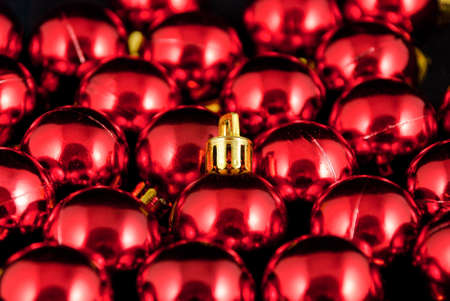 picture of a pile of red christmas ballsの写真素材