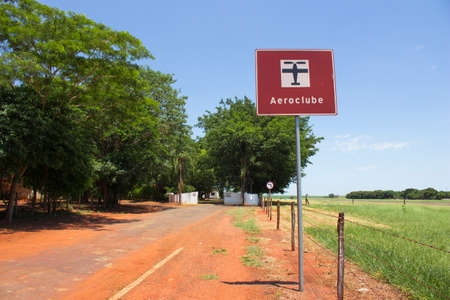 Ibitinga, SP, Brazil - 02 08 2021: Signpost of Ibitinga's flying club and the entrance view of the same clubのeditorial素材