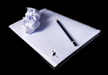 Notebook Shot In Studio Over Black Background