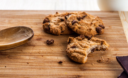 Golden Brown, Chocolate Chip Cookies On A Cutting Boardの写真素材