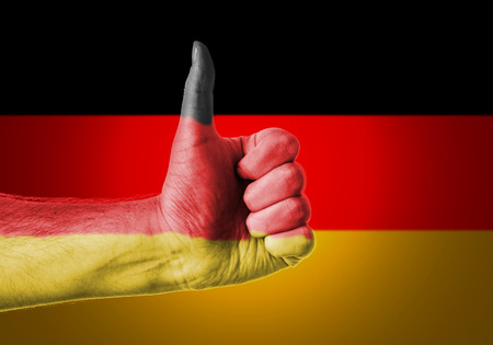Flag Of Germany Painted On A Manの写真素材