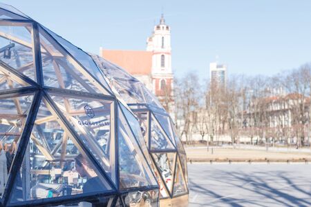 Vilnius Lithuania, March 03 2019: View on church of saint Jakob and Philip on Lukiskes square, the largest square in Vilnius Lithuania. Glass domes foreground.のeditorial素材