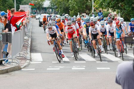MINSK, BELARUS - 22 June 2019: 2nd European Games Womens cycle road race. Cyclists going round a...